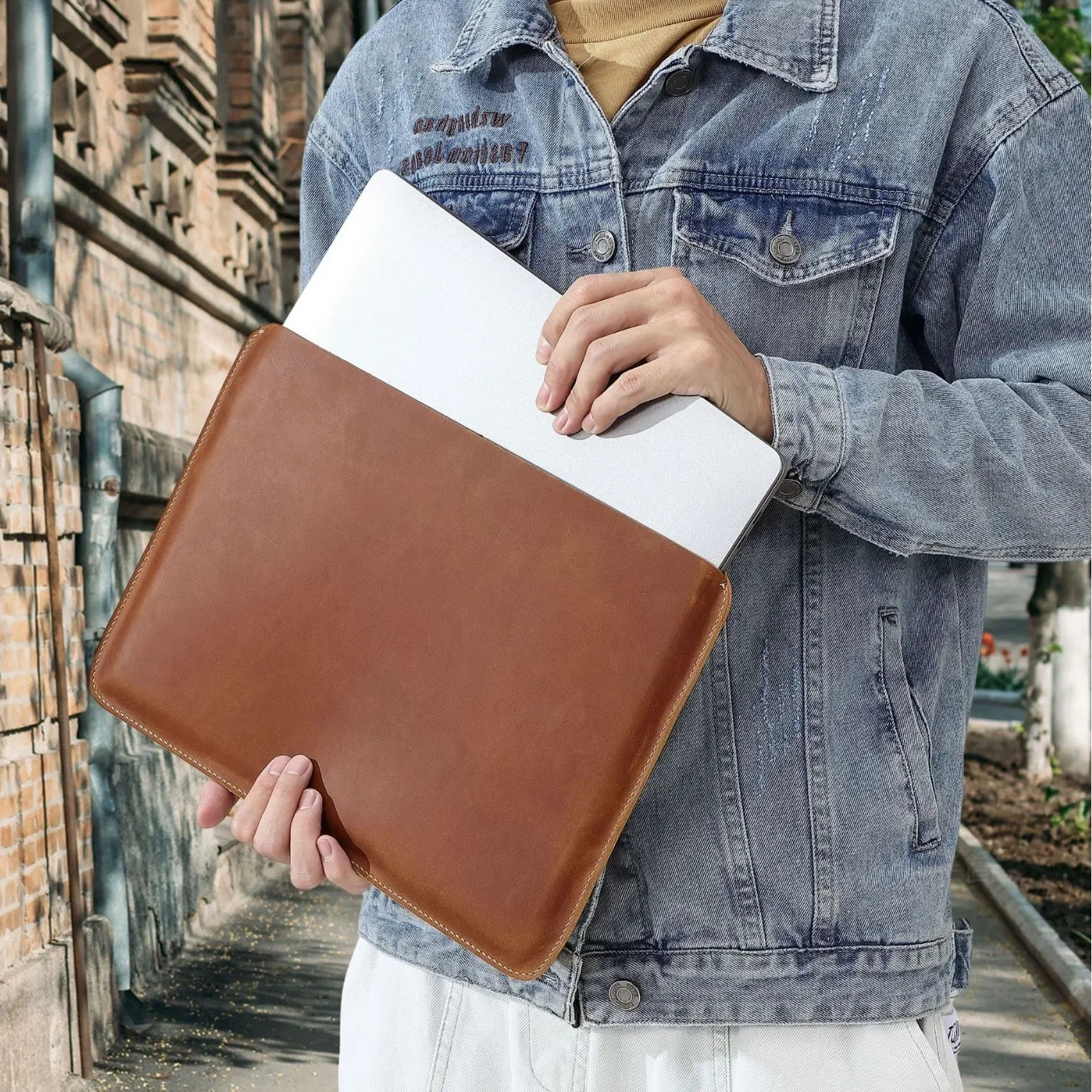 Professional executive with a perfectly proportioned leather briefcase