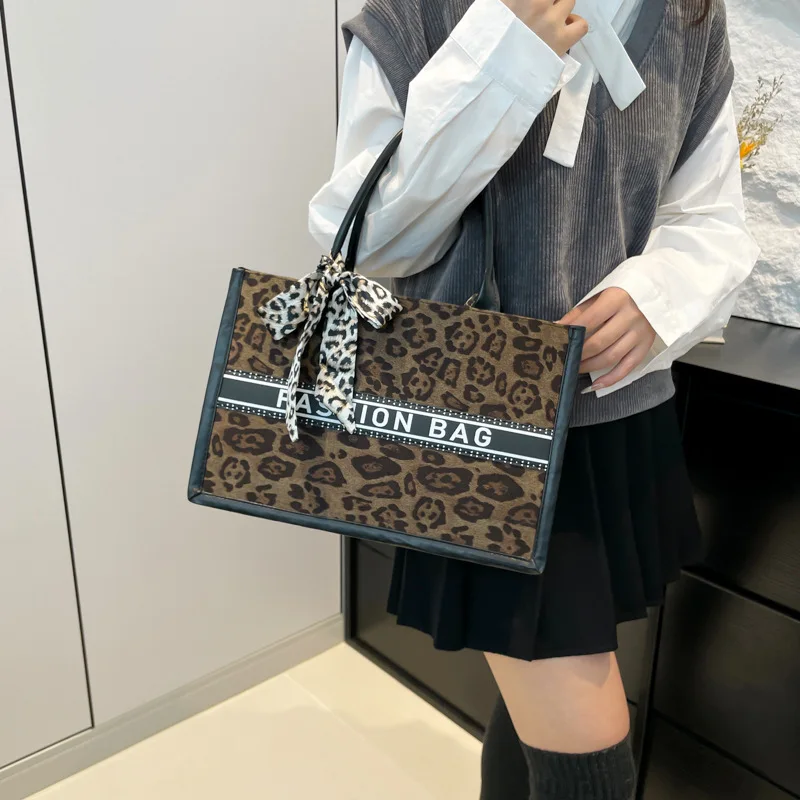 Statement vegan leather tote with fashionable details showing cruelty-free style doesn't compromise aesthetics