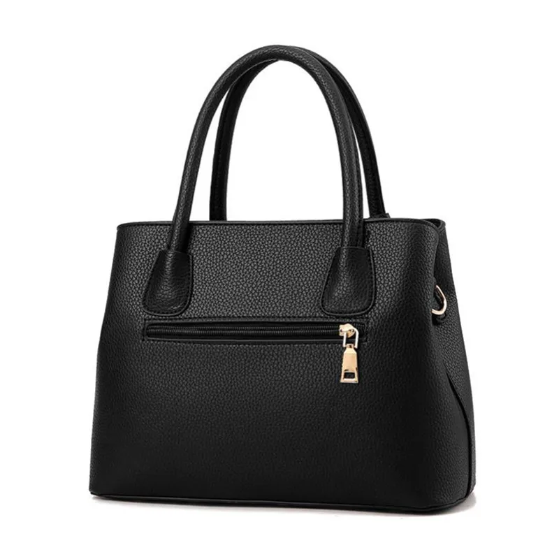 Organized interior of versatile tote bag showing compartments for work essentials