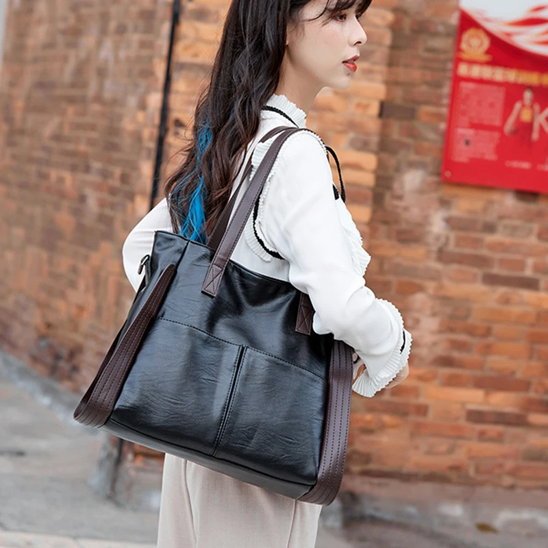Woman styling versatile work tote with multiple professional outfits