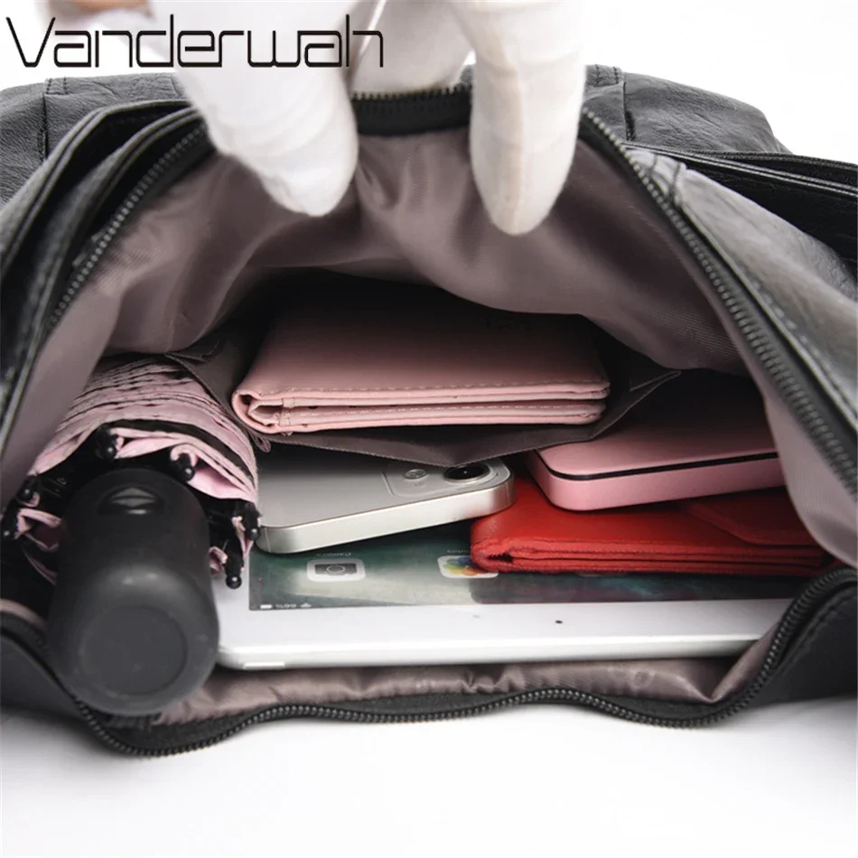 Multi-function storage compartments in a professional document-carrying bag