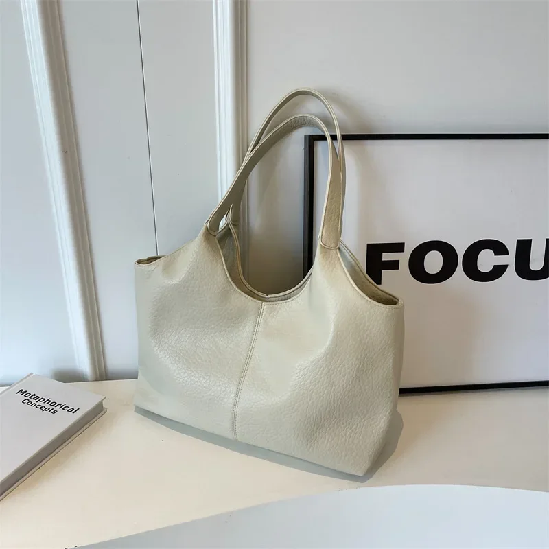 Versatile leather work bag suitable for professional and social settings