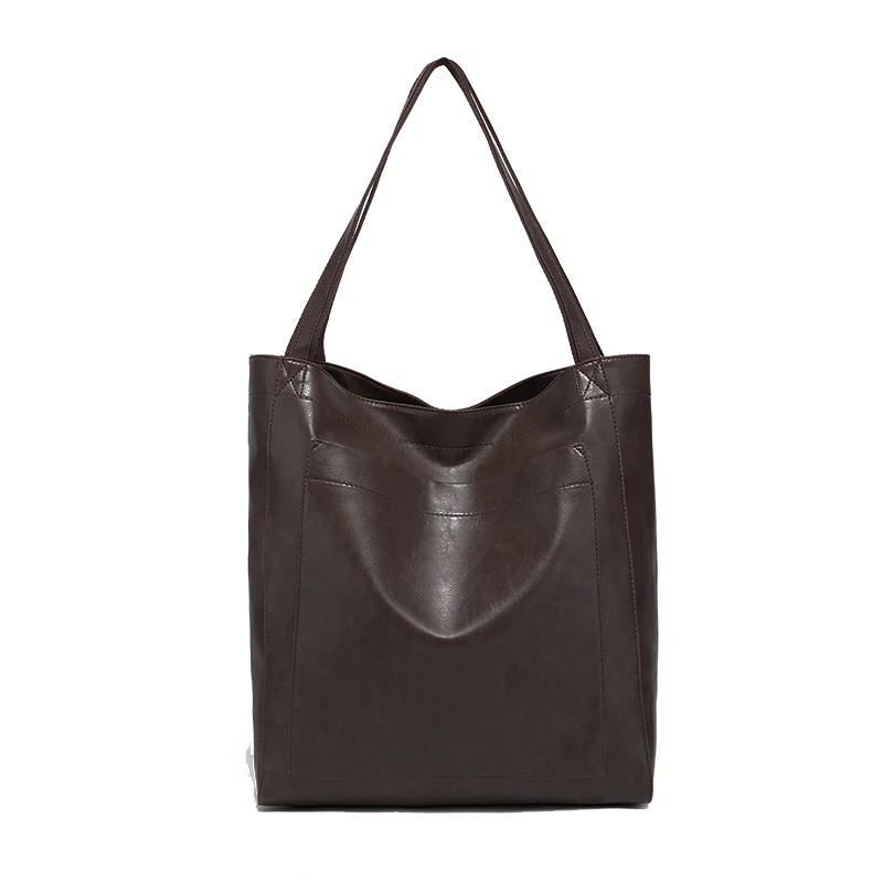 Versatile vegan leather tote with modern practicality at an accessible price point